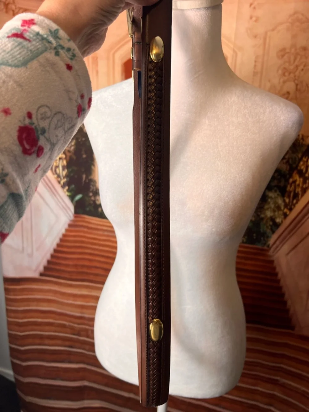 Izod Unique vintage genuine leather belt features a classic brown leather strap